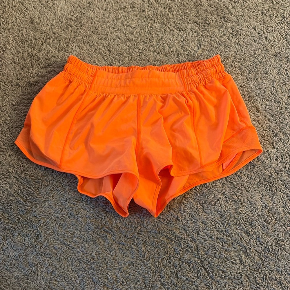 Lululemon highlighter orange hotty hot shorts